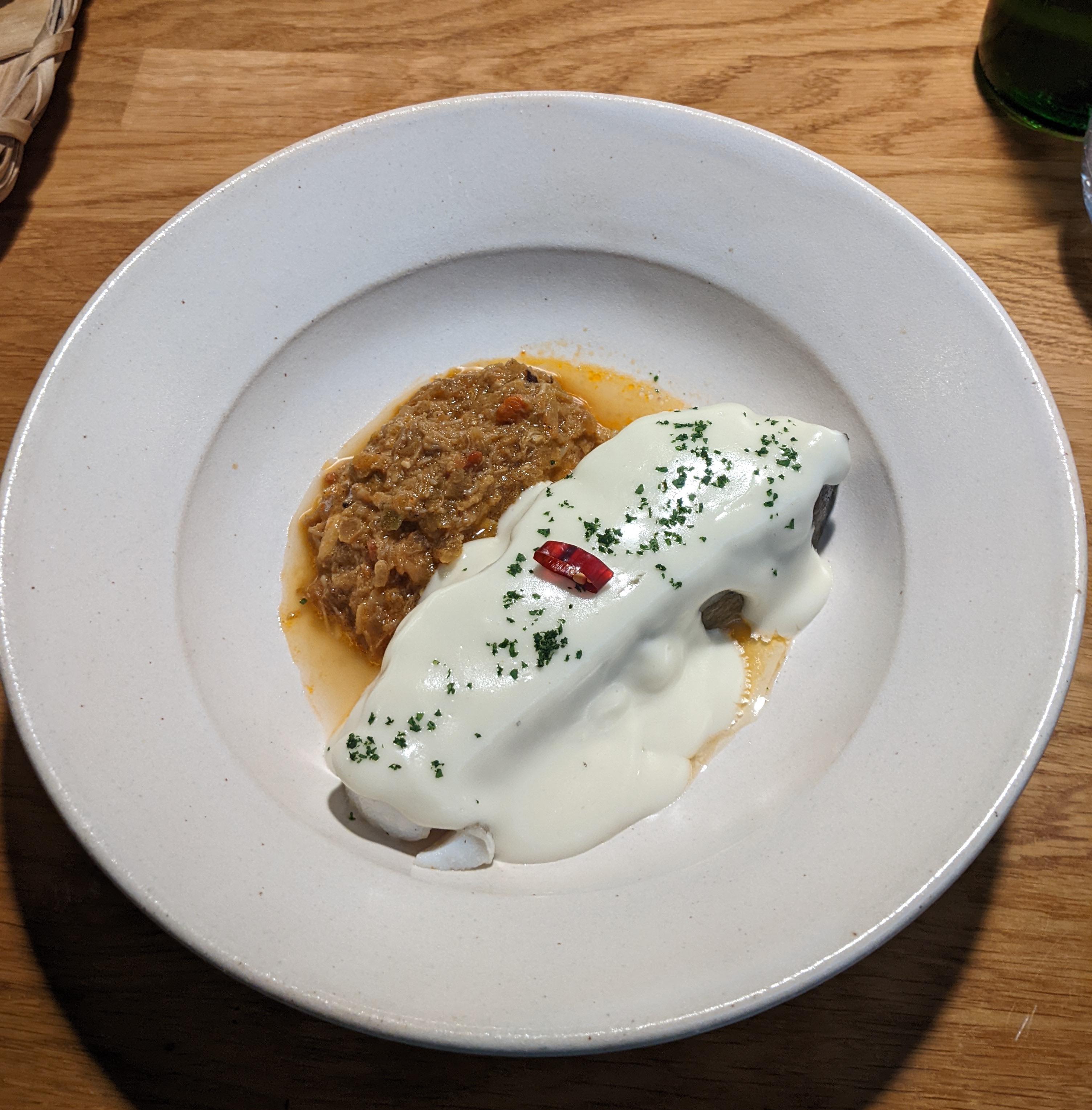 cod fillet confited with pil pil sauce and spider crab in Donostia style at Bodegon Alejandro